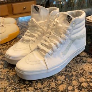 All White men’s high top Vans